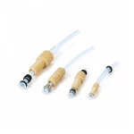 Four RZFLARECUSTOM PEEK flanged fitting assemblies on tubing