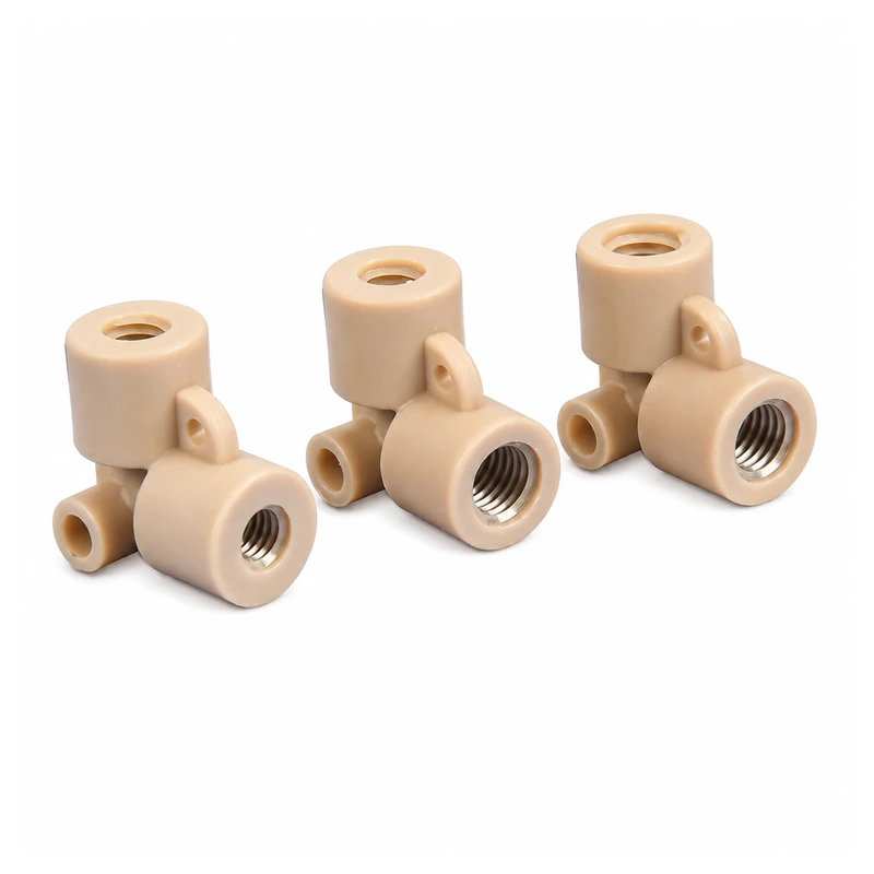 Three RZNL05 PEEK L-shaped female-thread fittings
