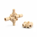 Two RZNS04 beige PEEK female-thread cross fittings