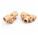Two RZNT03 beige PEEK female-thread T fittings