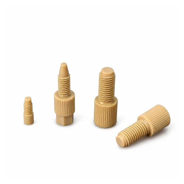Four RZWDDP beige PEEK threaded plugs in different profiles